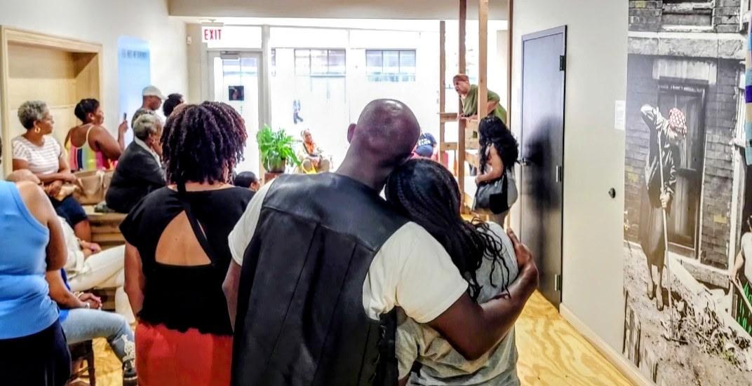 Community gathered inside The Ways We Remember